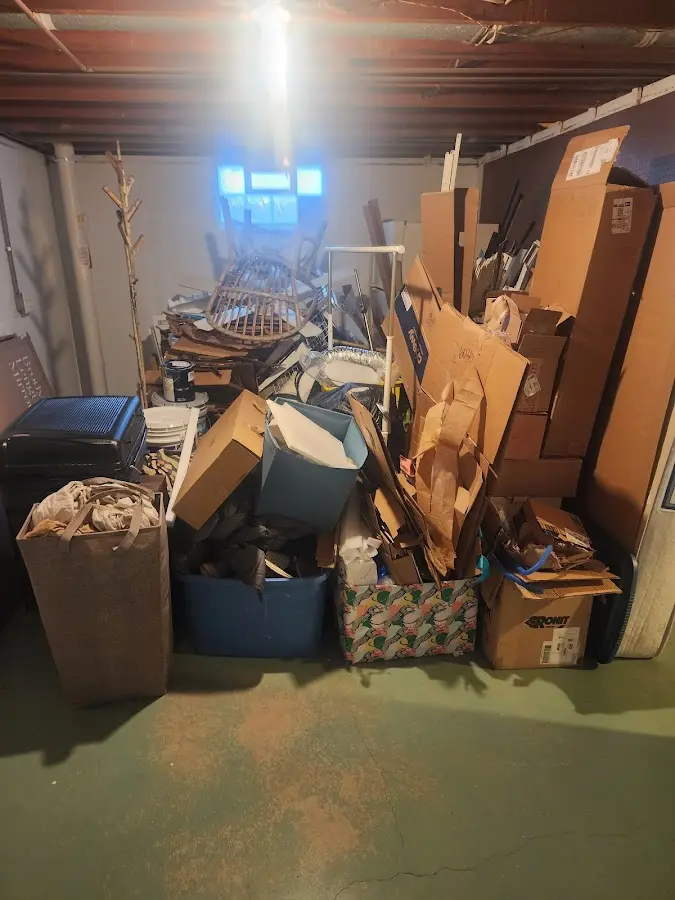 Roll-off dumpster container at job site for 2 Yard Dumpster Rental in Plymouth